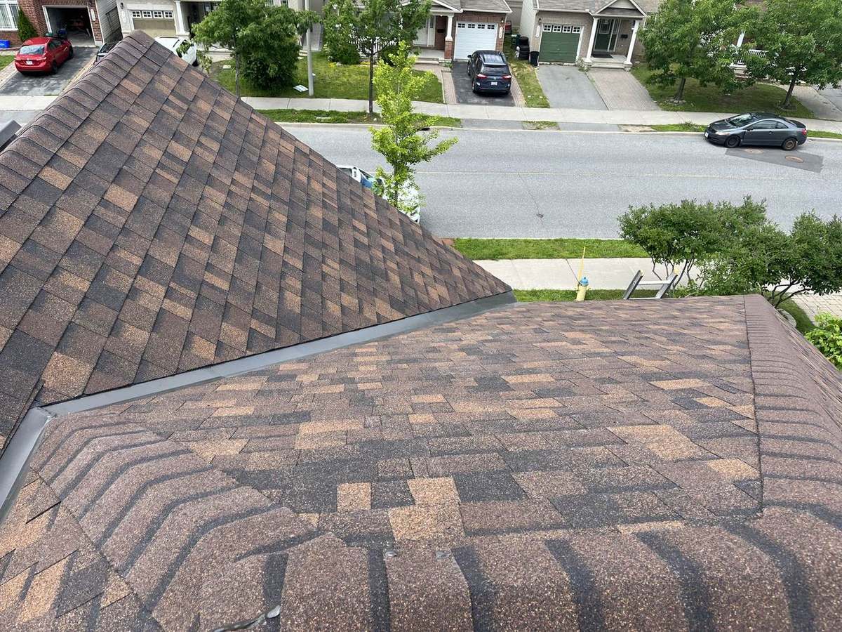 Completed asphalt shingle roof by Rob's Quality Roofing near Osgoode, Ontario