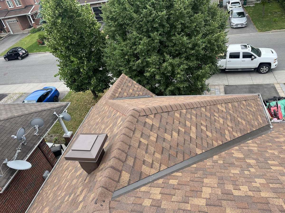 Completed asphalt shingle roof by Rob's Quality Roofing near Manotick, Ontario