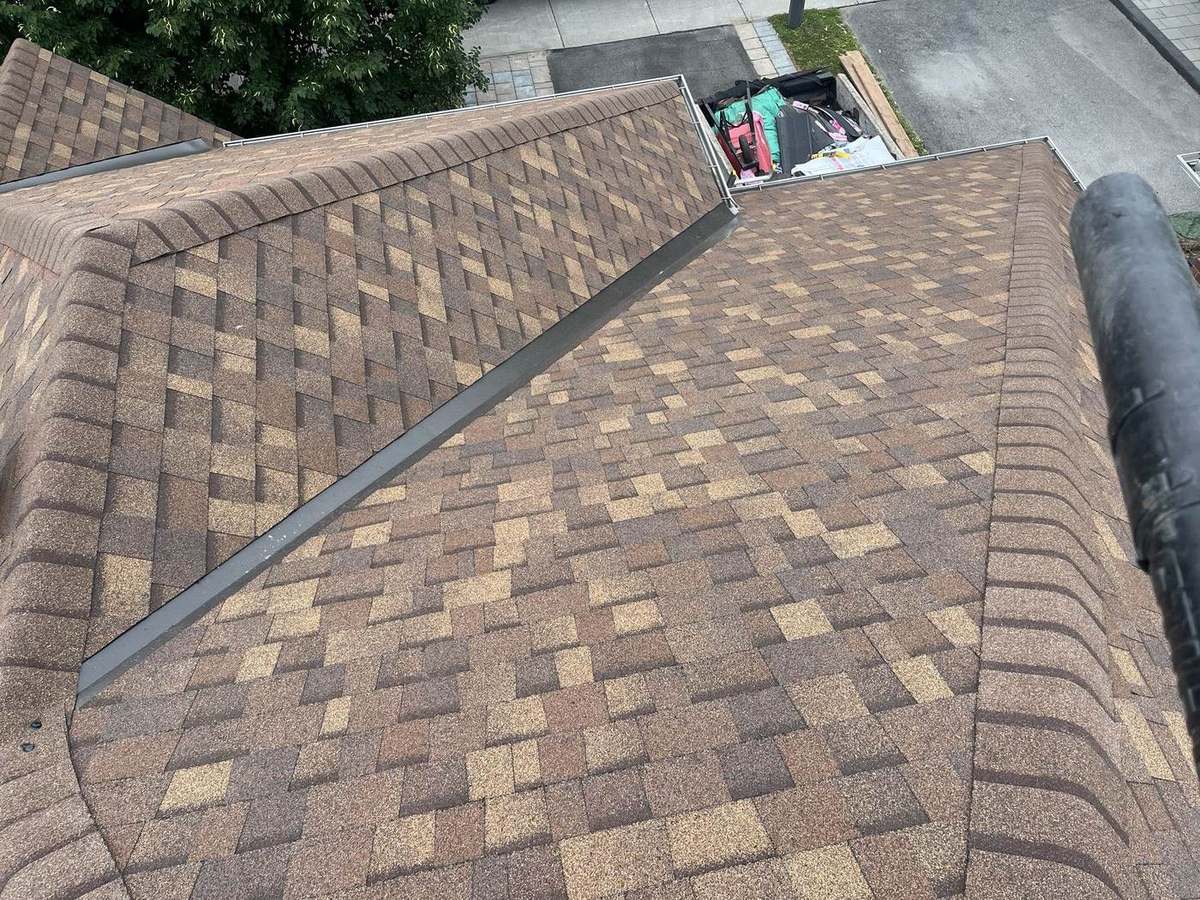 Completed Desert Rose asphalt shingle roof by Rob's Quality Roofing