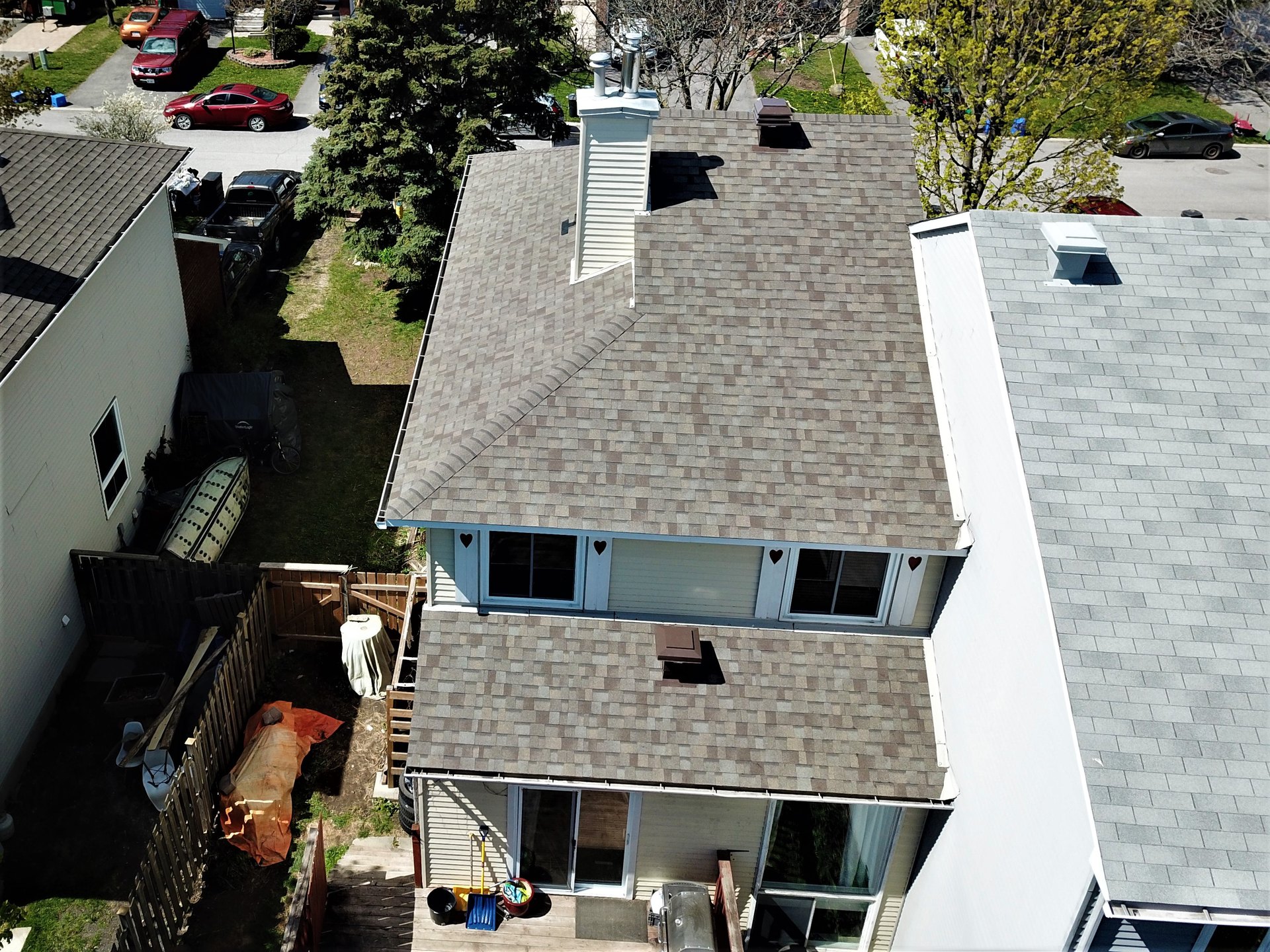 Completed asphalt shingle roof by Rob's Quality Roofing near Richmond, Ontario