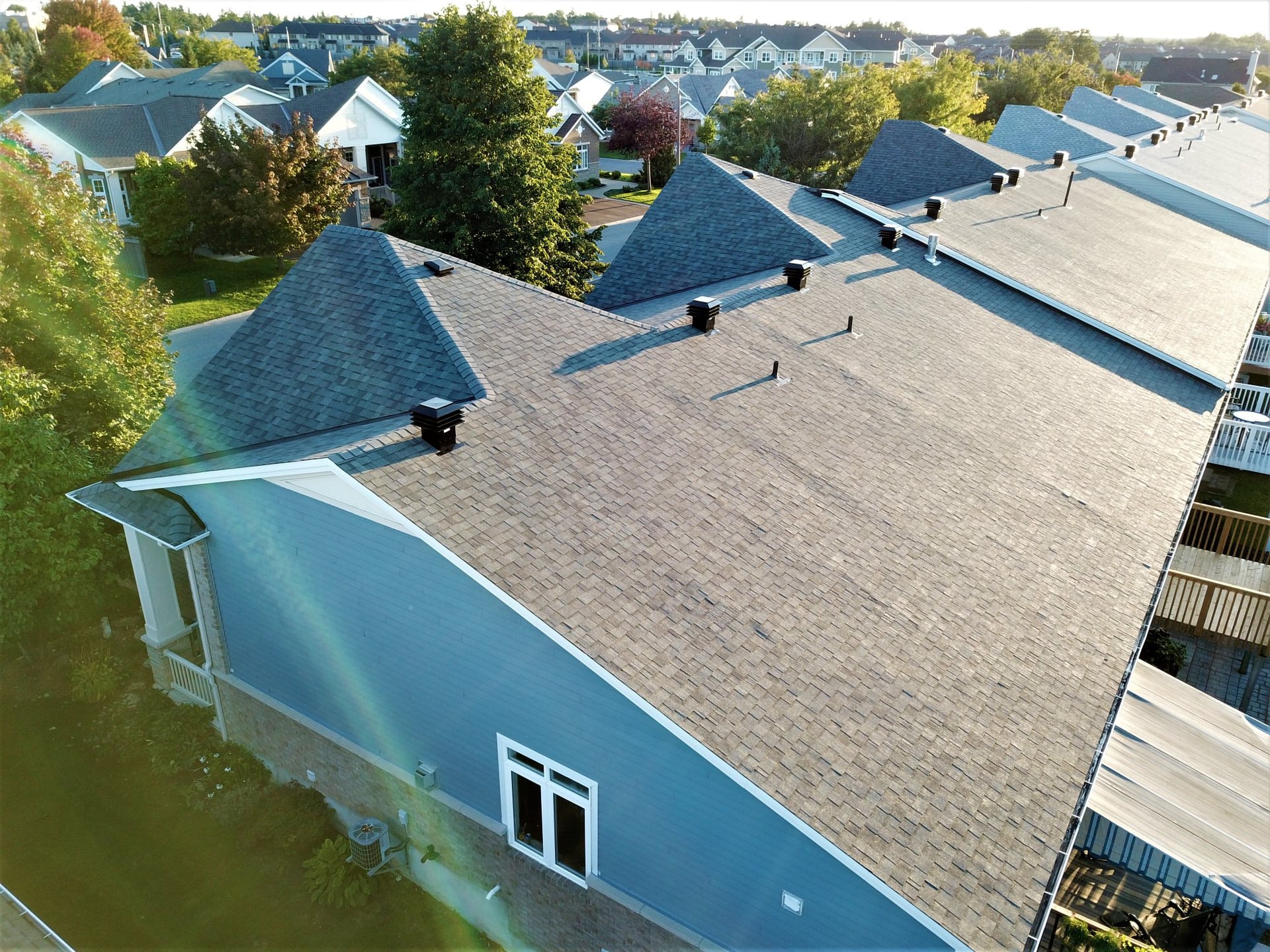 Completed asphalt shingle roof by Rob's Quality Roofing near North Gower, Ontario