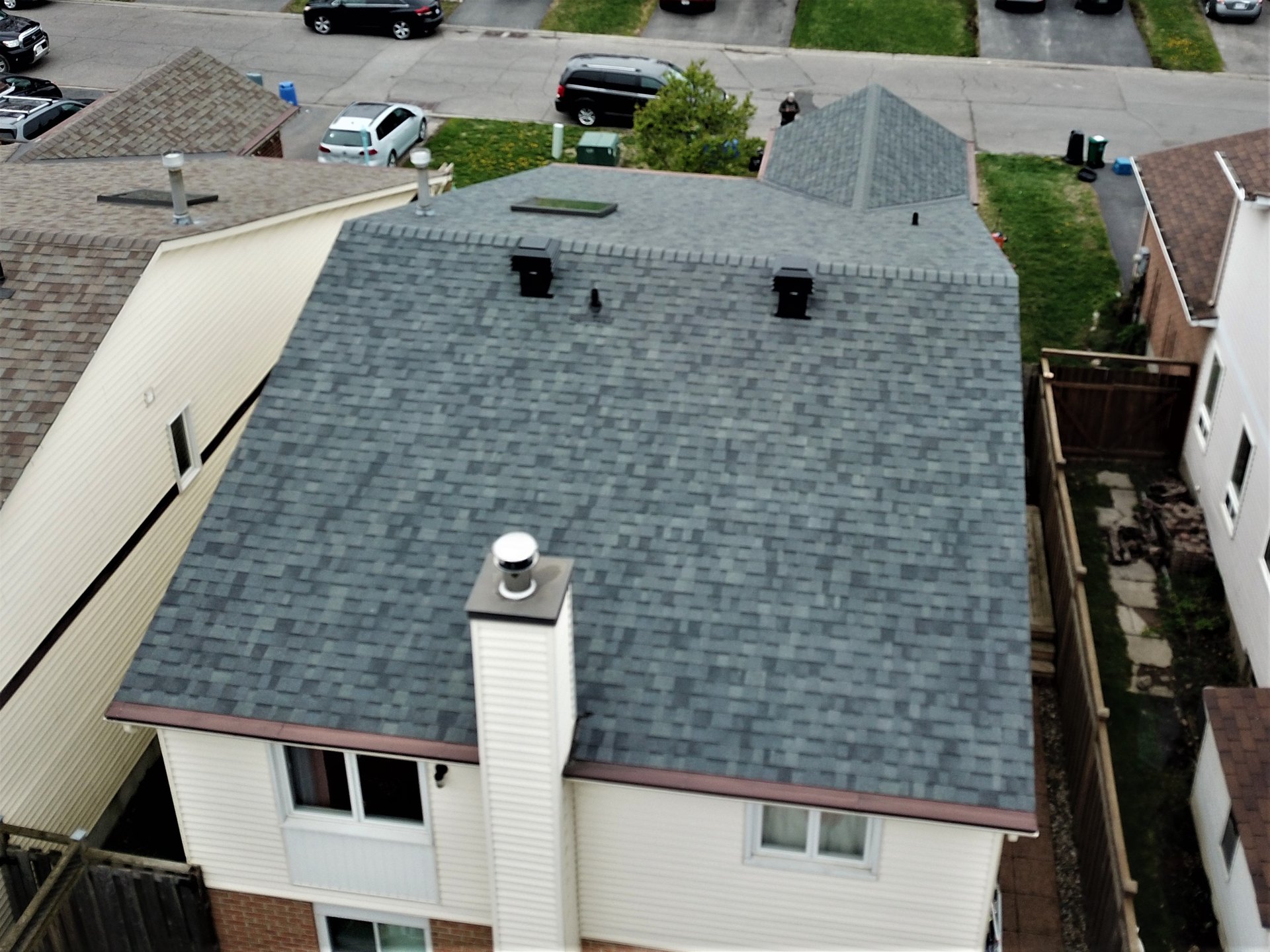 Completed asphalt shingle roof by Rob's Quality Roofing near Blossom Park, Ontario
