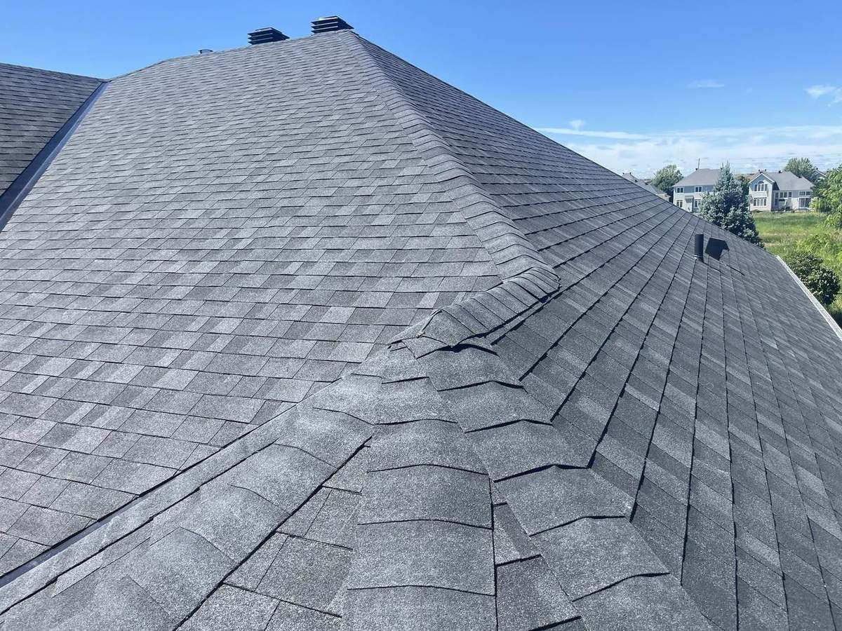 Completed asphalt shingle roof by Rob's Quality Roofing near Smiths Falls, Ontario