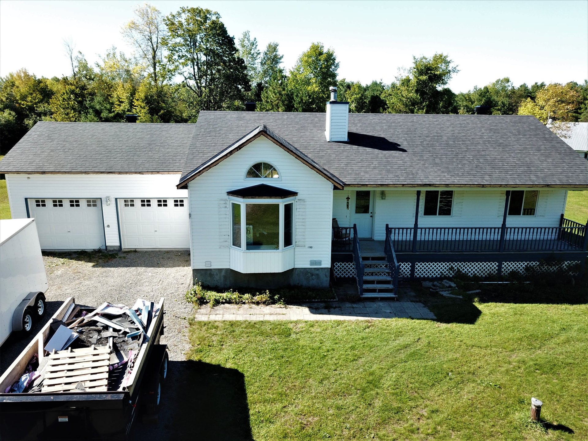 Completed asphalt shingle roof by Rob's Quality Roofing near Bells Corners, Ontario