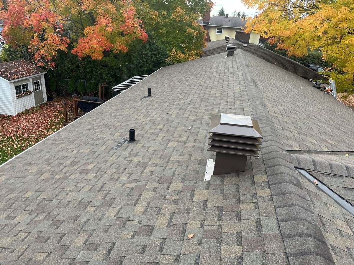 Completed asphalt shingle roof by Rob's Quality Roofing near Carleton Place, Ontario